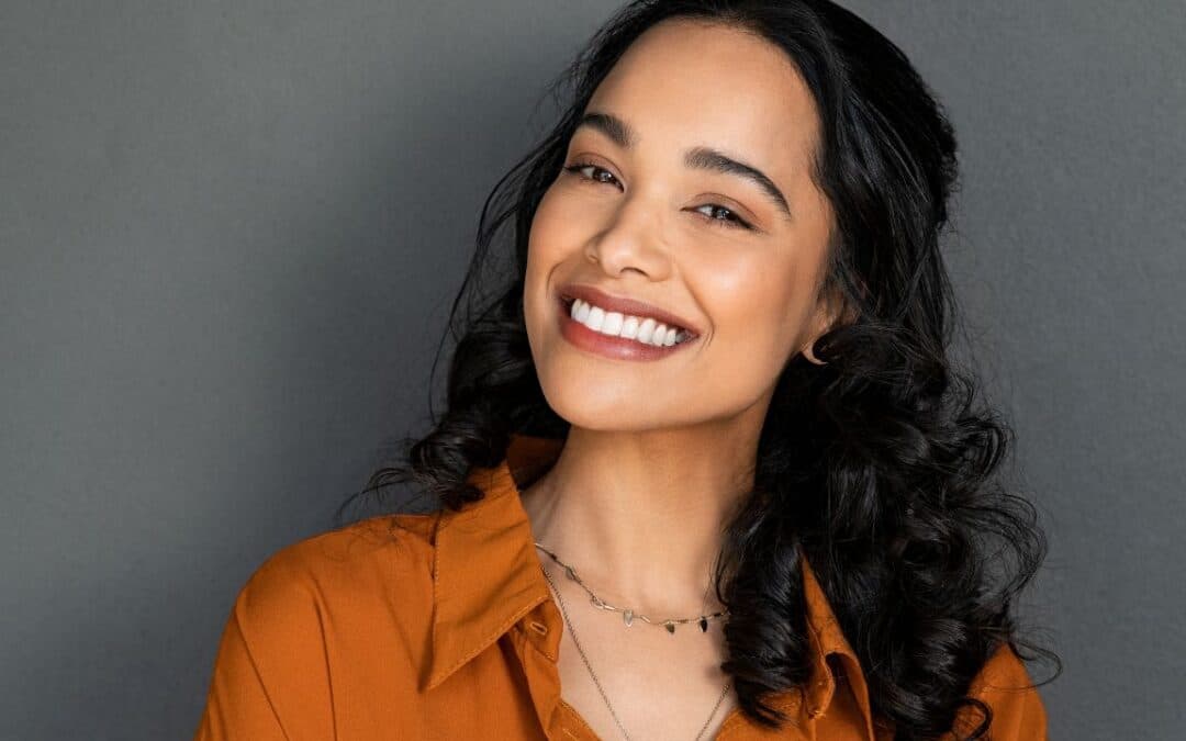 Happy latin beautiful woman smiling