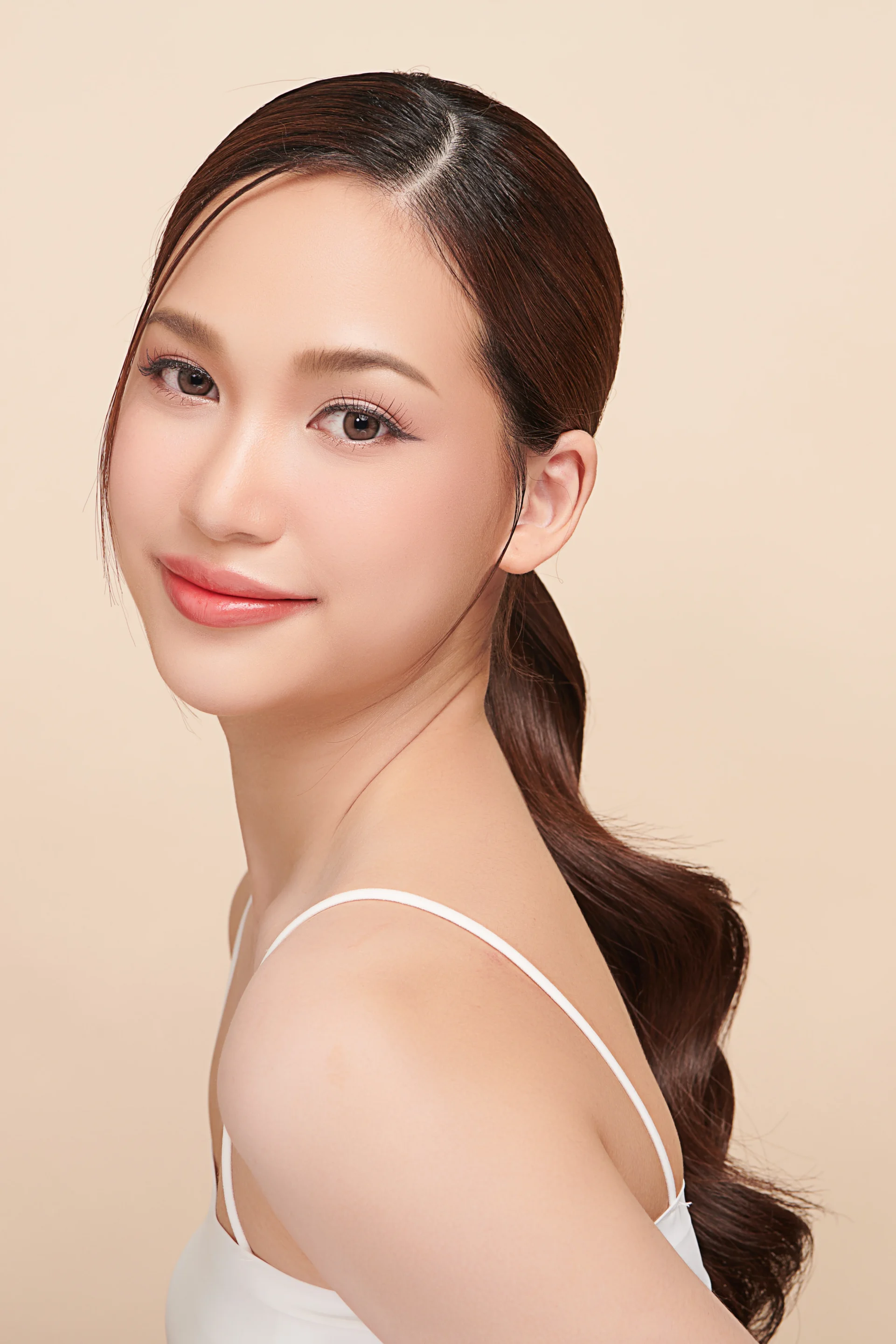A beautiful young Asian woman with clean, fresh skin